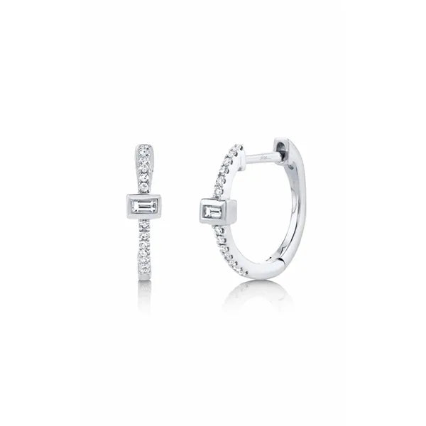 Shy Creation Huggies Earrings in 14K White Gold with Round Diamonds. These earrings offer total weight 0.12 ctw, Hinged Huggie closure.