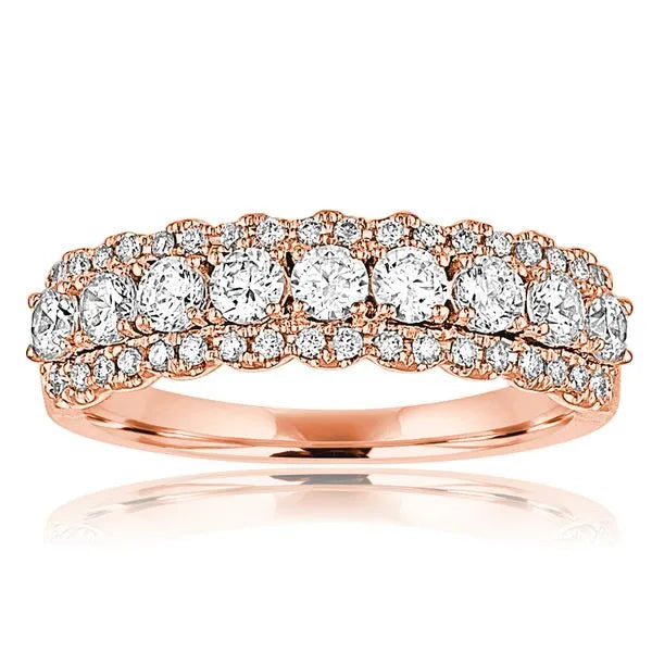 This gold 14K Rose' Gold rose wedding band features a comfort fit style with a comfort fit setting. The design is accented with diamonds totaling about 0.018 carats.