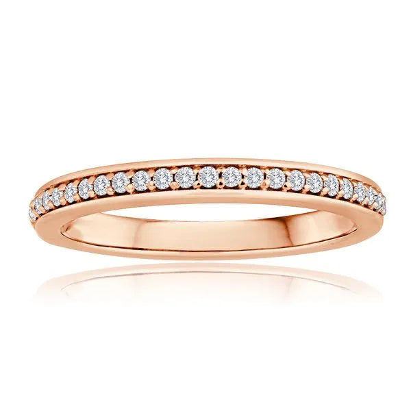 This gold 14K Rose' Gold rose wedding band features a comfort fit style with a comfort fit setting. The design is accented with diamonds totaling about 0.007 carats.