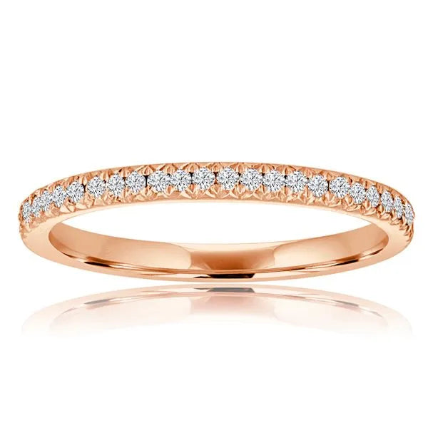 This gold 14K Rose' Gold rose wedding band features a pavé style with a pavé setting. The design is accented with diamonds totaling about 0.021 carats.
