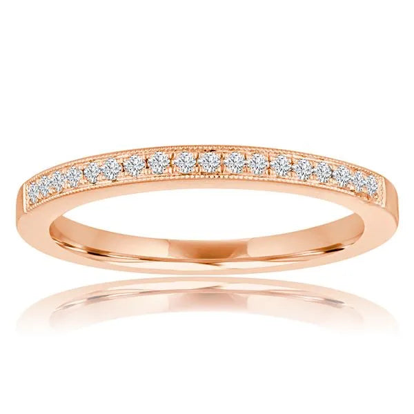 This gold 14K Rose' Gold rose wedding band features a pavé style with a pavé setting. The design is accented with diamonds totaling about 0.006 carats.
