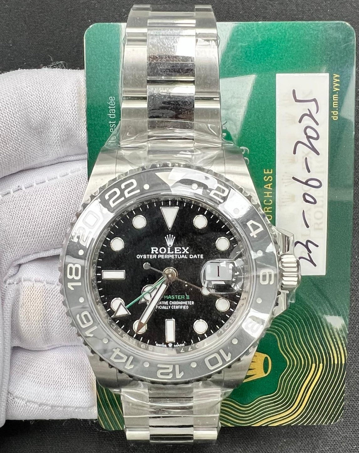 Pre-Owned Rolex GMT MASTER II 126710GRNR