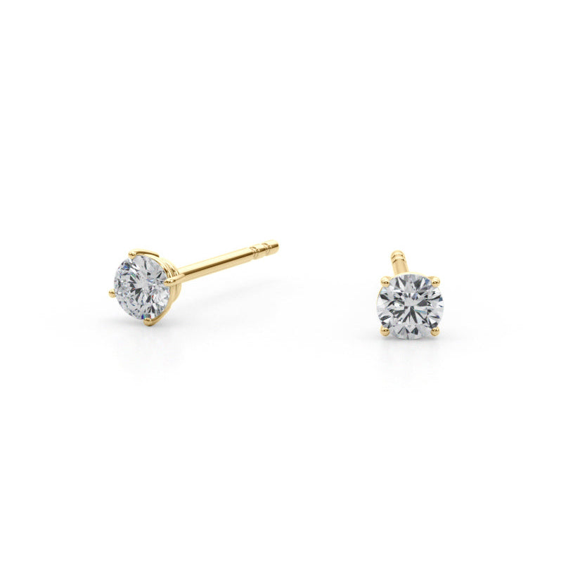 yellow Gold diamond stud earrings on a white background