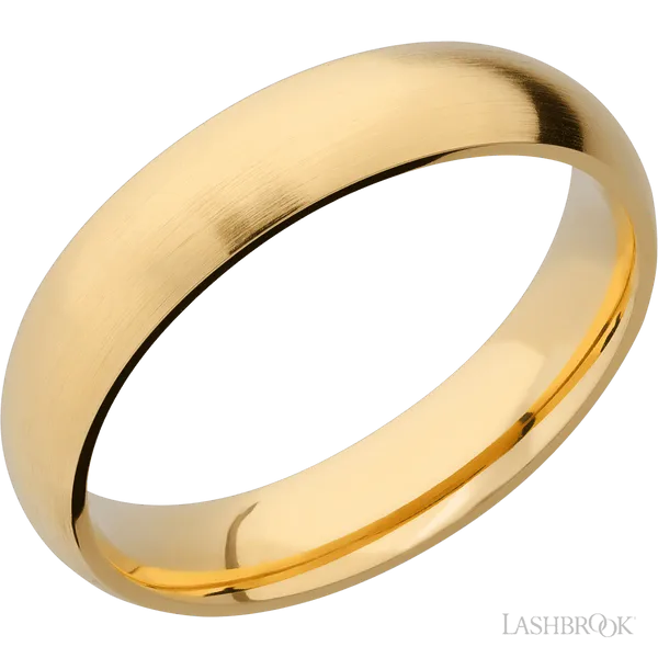 This Yellow Gold wedding band features a domed style with a domed setting. The piece is polished and elegant, crafted without diamonds for a refined finish.
