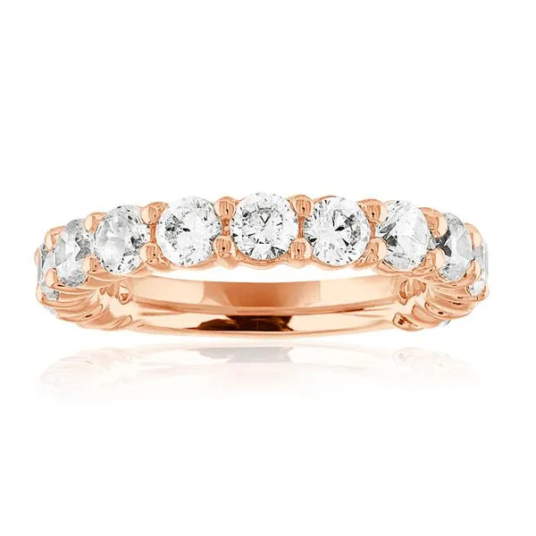 This gold 14K Rose' Gold rose wedding band features a wedding band style with a wedding band setting. The design is accented with diamonds totaling about 2.0 carats.