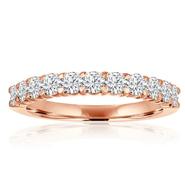 This gold 14K Rose' Gold rose wedding band features a comfort fit style with a comfort fit setting. The design is accented with diamonds totaling about 0.11 carats.