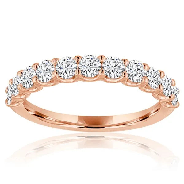 This gold 14K Rose' Gold rose wedding band features a wedding band style with a wedding band setting. The design is accented with diamonds totaling about 0.25 carats.