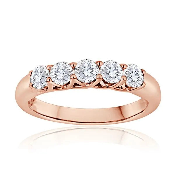 This gold 14K Rose' Gold rose wedding band features a pavé style with a pavé setting. The design is accented with diamonds totaling about 0.55 carats.