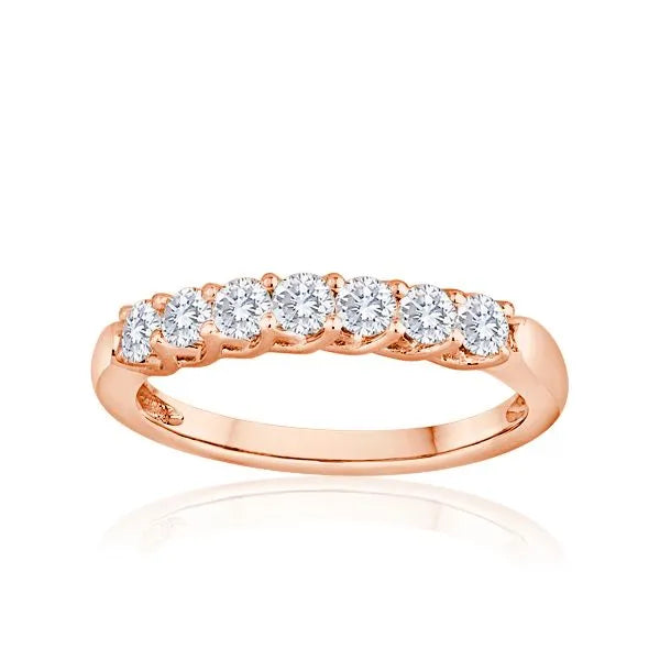 This gold 14K Rose' Gold rose wedding band features a comfort fit style with a comfort fit setting. The design is accented with diamonds totaling about 0.5 carats.