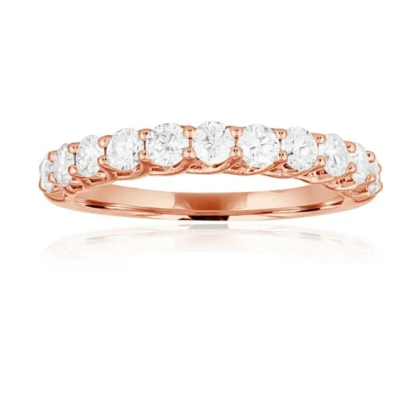 This gold 14K Rose' Gold rose wedding band features a stackable style with a stackable setting. The design is accented with diamonds totaling about 0.25 carats.