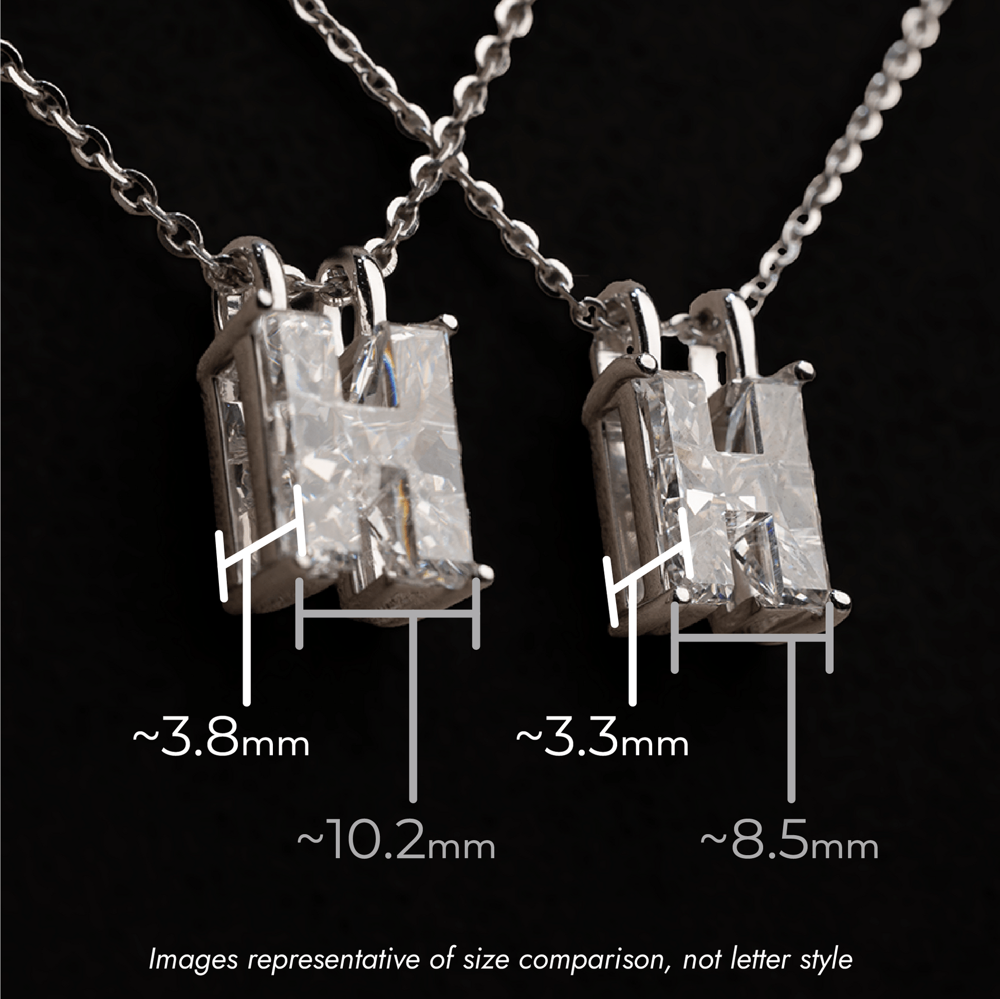 Two single diamond pendants on a chain with size measurements against a black background, one is labeled 10.2mm wide and 3.8mm deep, the other is 8.5mm wide and 3.3mm deep.