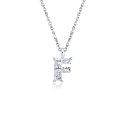 White gold necklace with an "F" shaped single diamond pendant on a white background