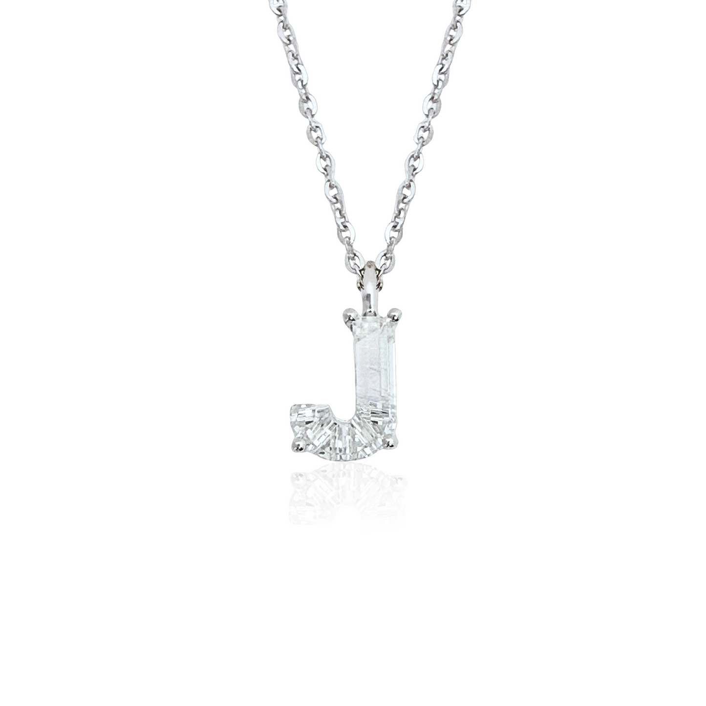 White gold necklace with a 'J' shaped diamond pendant on a white background