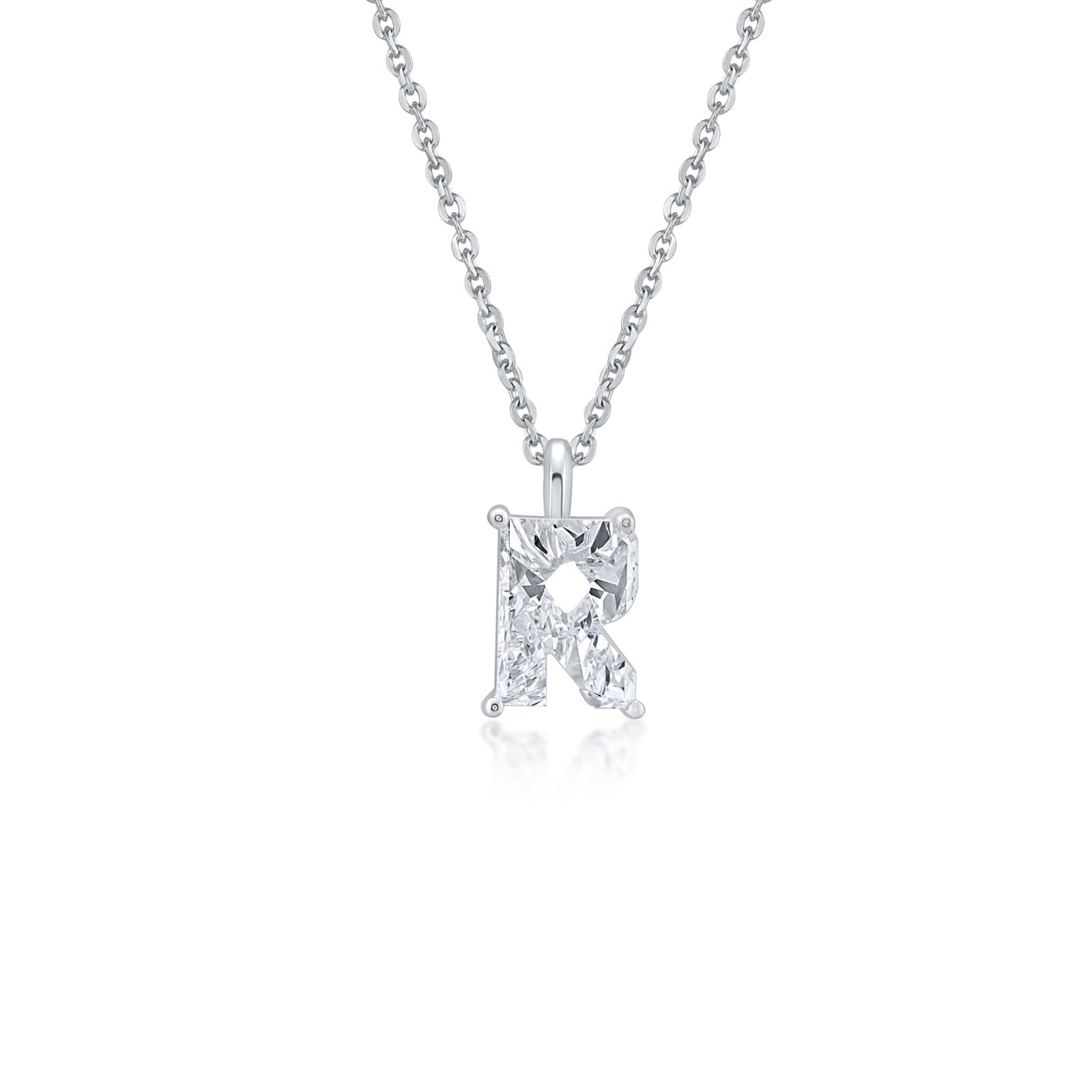 White gold necklace with an "R" shaped single diamond pendant on a white background