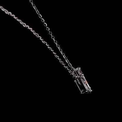 White gold necklace with a "P" shaped diamond letter pendant rotating from various angles over a dark background