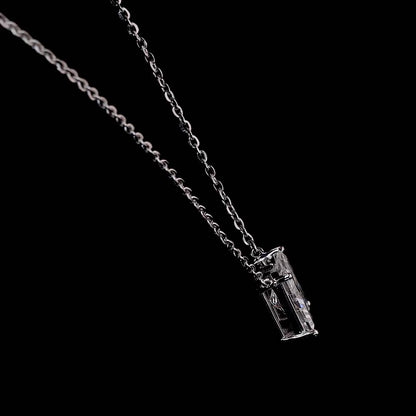 White gold necklace with an "H" shaped diamond letter pendant rotating from various angles over a dark background